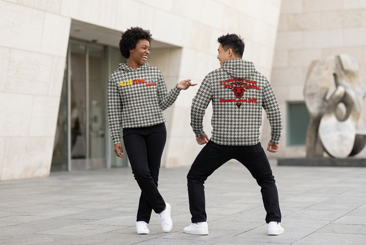 Playful gallery scene with a woman showing the houndstooth hoodie front and a man showing the back
