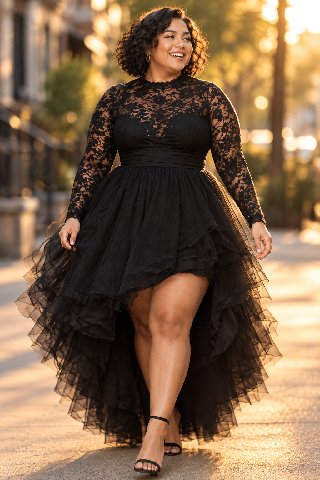 Plus-size model walking outdoors in the lace and tulle dress